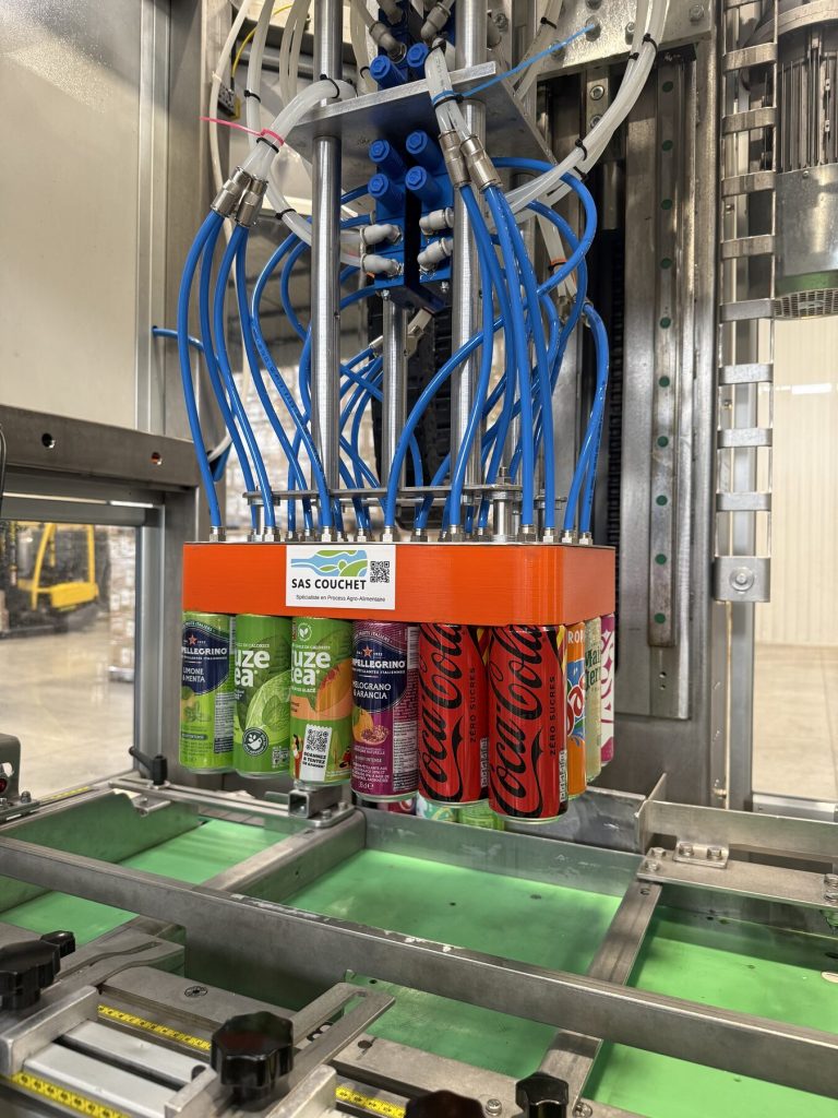 Outillage de prehension pour canettes Slick fabrique par SAS COUCHET sur ligne de production